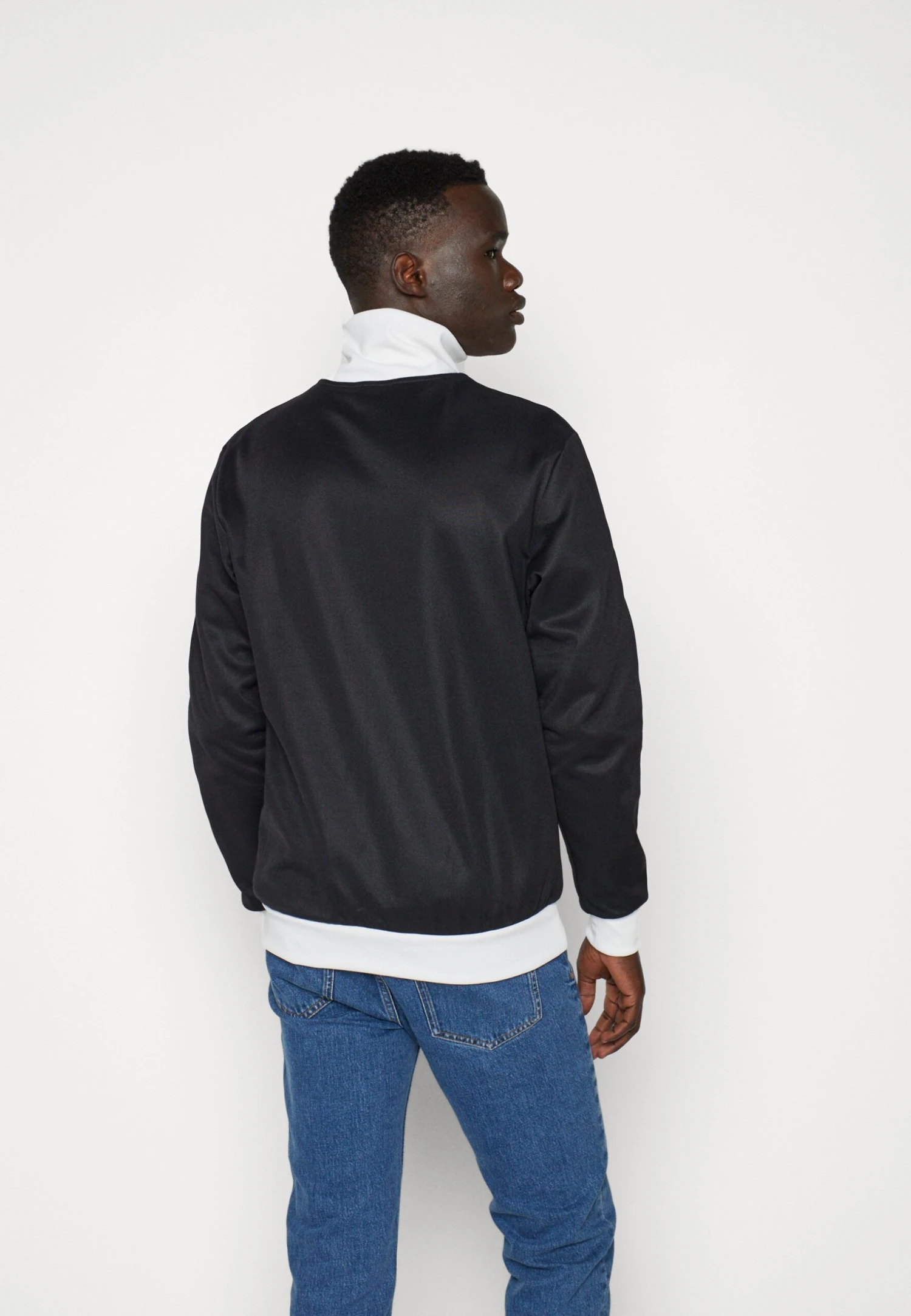 Adidas Originals Beckenbauer TtGiacca SportivaBlack/White Uomo Pantaloni Sportivi E Joggers AD122T0DC-Q11 5 Adidas Originals Beckenbauer TtGiacca SportivaBlack/White Uomo Pantaloni Sportivi E Joggers AD122T0DC-Q11 - immagine 3