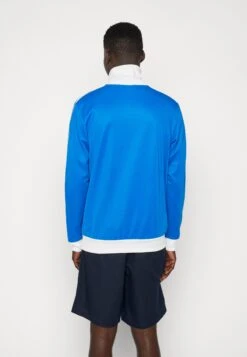 Adidas Originals Beckenbauer TtGiacca SportivaBlue Bird/White Uomo Pantaloni Sportivi E Joggers AD122T0DC-K11 11 Adidas Originals Beckenbauer TtGiacca SportivaBlue Bird/White Uomo Pantaloni Sportivi E Joggers AD122T0DC-K11 -Negozio Di Abbigliamento Zalando 9121d9b14a7043bfa64806b8dc3f3142