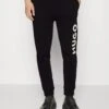 Hugo DutschiPantaloni SportiviBlack Uomo Pantaloni Sportivi E Joggers HU722E09O-Q12 1 Hugo DutschiPantaloni SportiviBlack Uomo Pantaloni Sportivi E Joggers HU722E09O-Q12 -Negozio Di Abbigliamento Zalando fba0ff0555904c8189e1fc4577d0d367