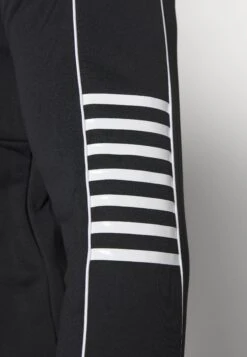 EA7 Emporio Armani Core SuitTutaBlack Uomo Pantaloni Sportivi E Joggers EA742K00Y-Q11 -Negozio Di Abbigliamento Zalando ffdded999fff4541907ab7082379d81b